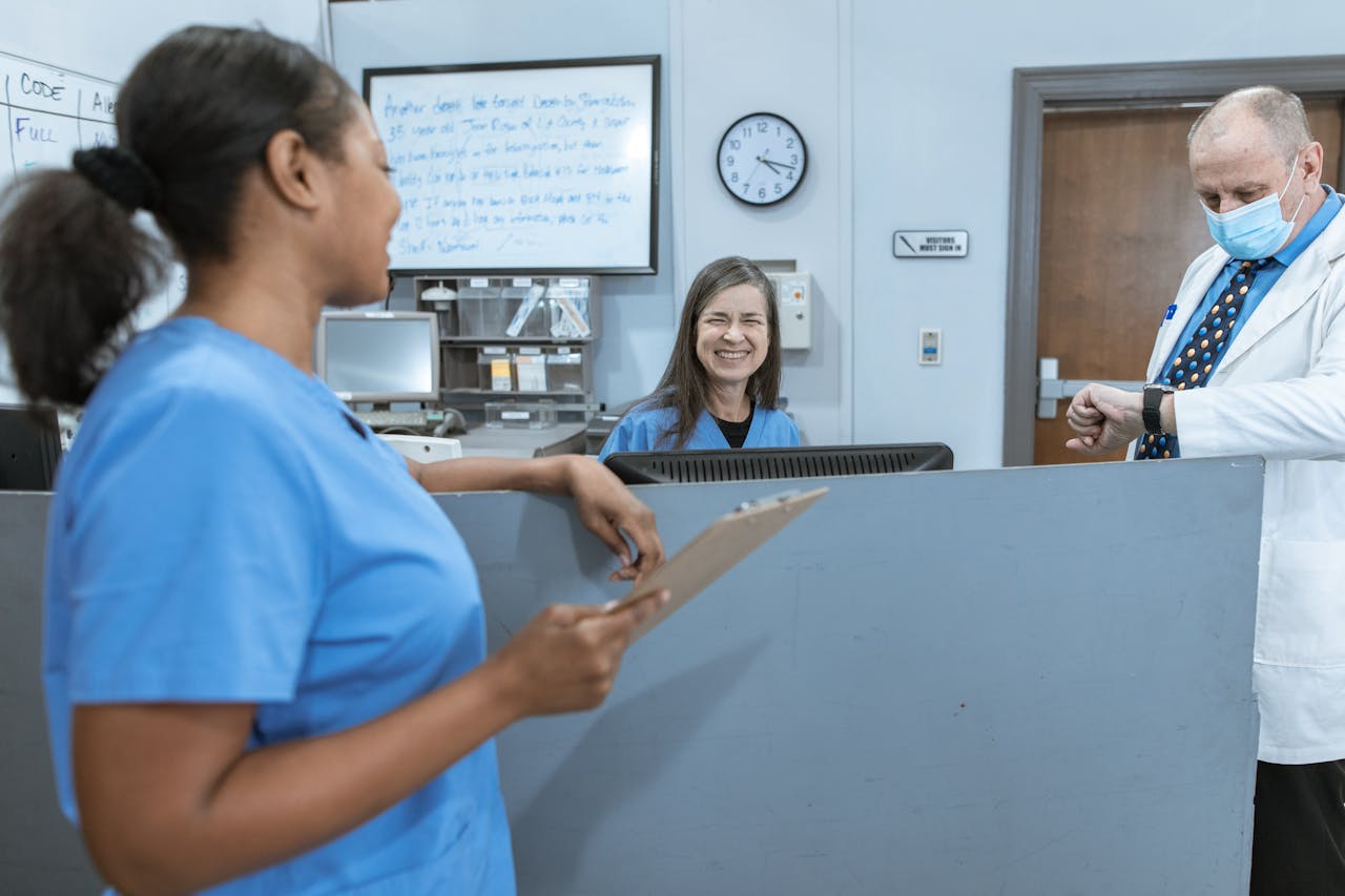why-choose-me Doctors and nurses working together in a hospital, focused on patient care.